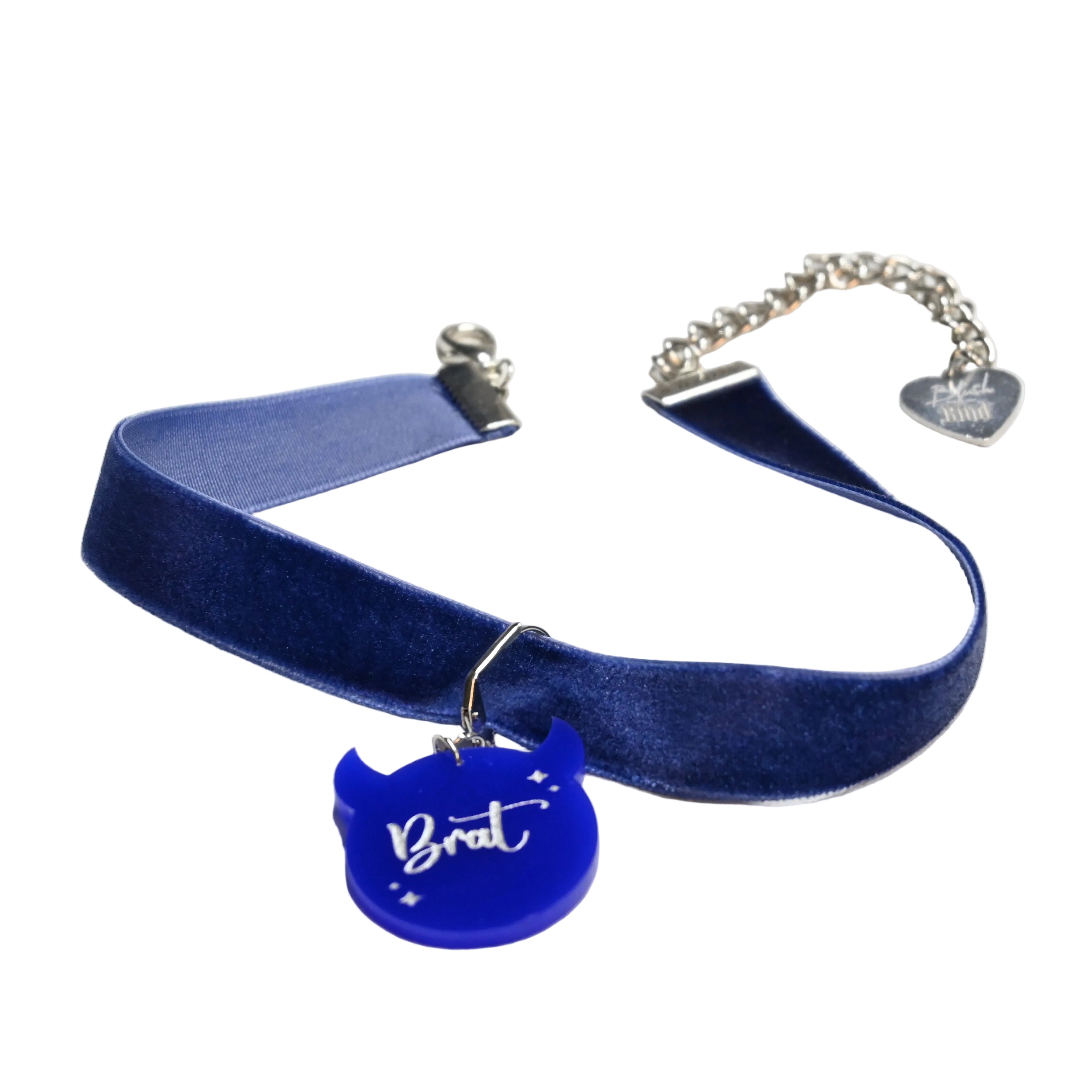 Blue velvet choker collar with silver toned hardware and blue brat charm.