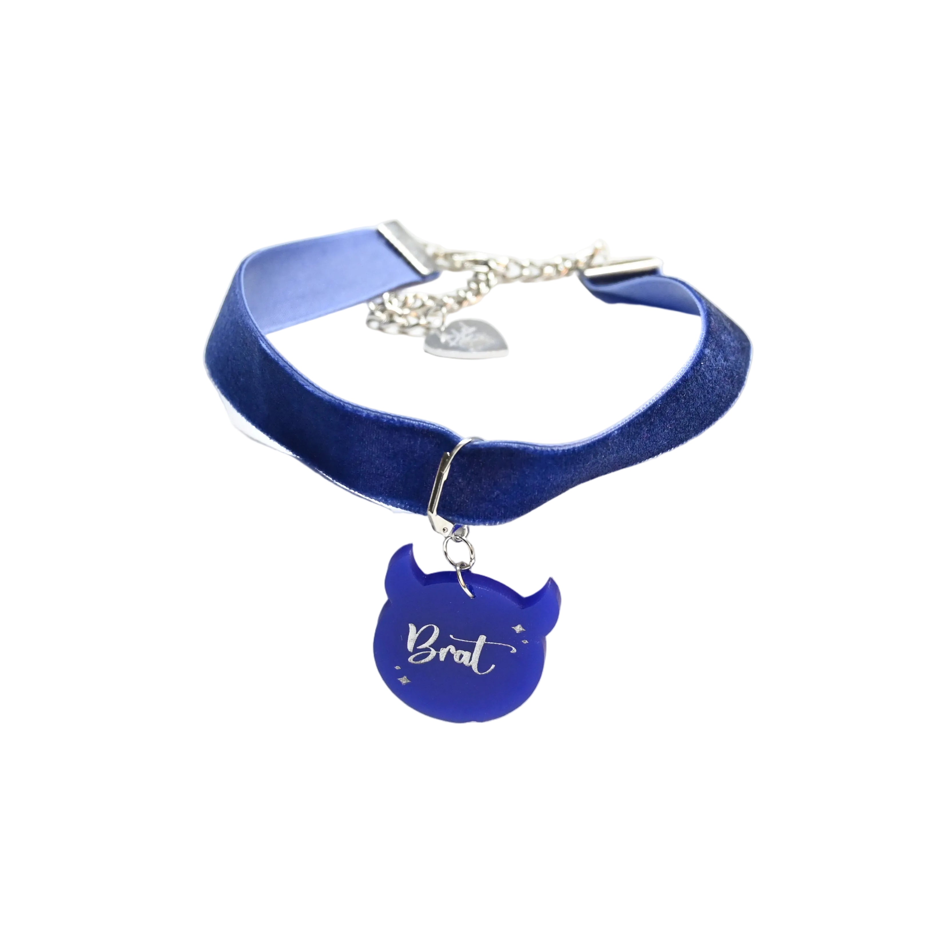 Blue velvet choker collar with silver toned hardware and blue brat charm.